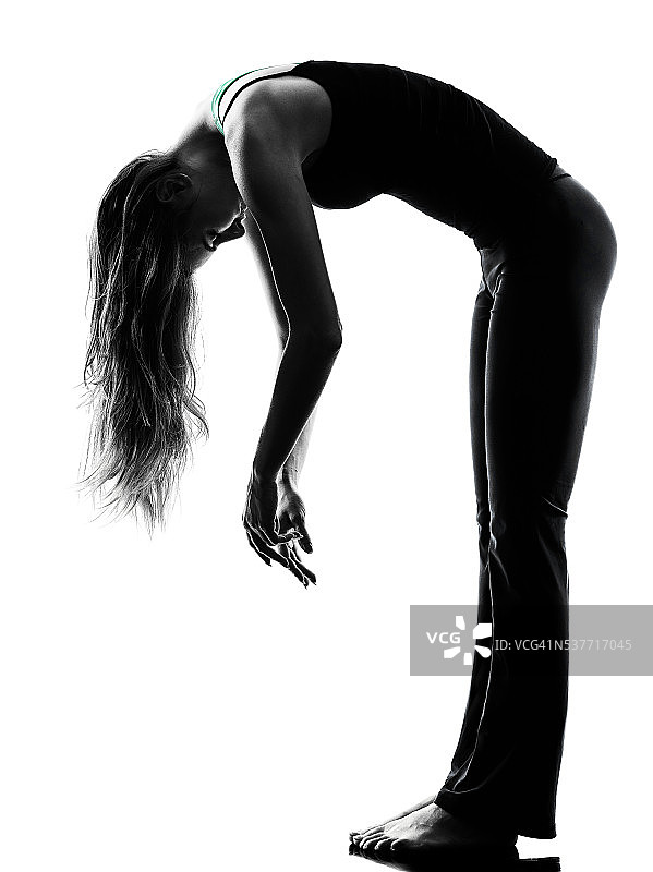 女舞者伸展热身运动剪影图片素材