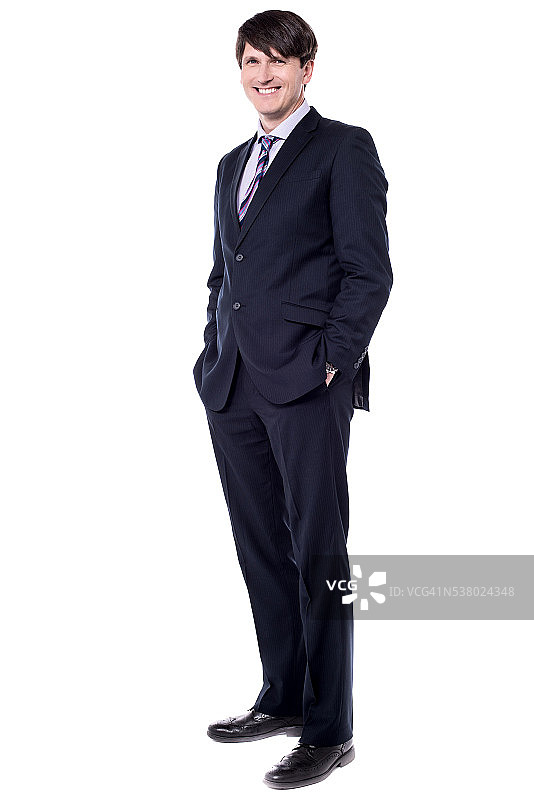 优雅商人双手插兜站立图片素材