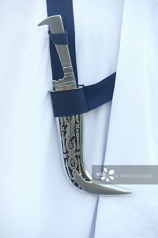 锡克教徒佩戴的卡尔潘弯刀图片素材