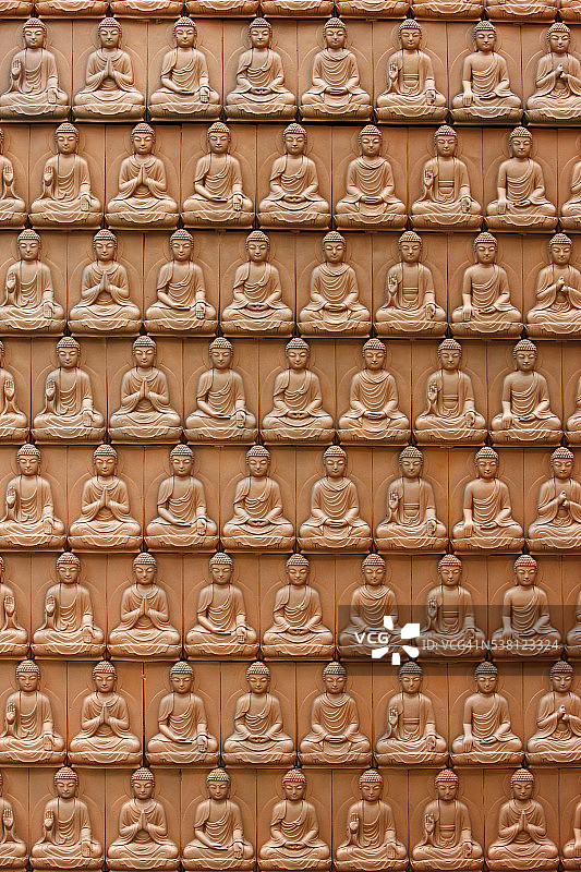 不同手印的佛像雕塑图片素材