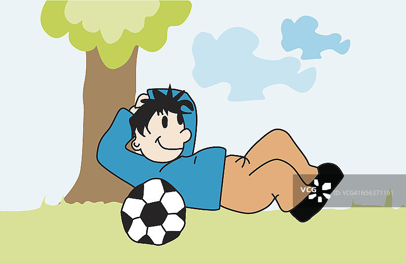 男孩躺在树下图片素材