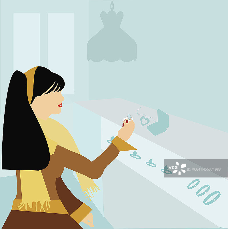 在珠宝店看珠宝的女人图片素材