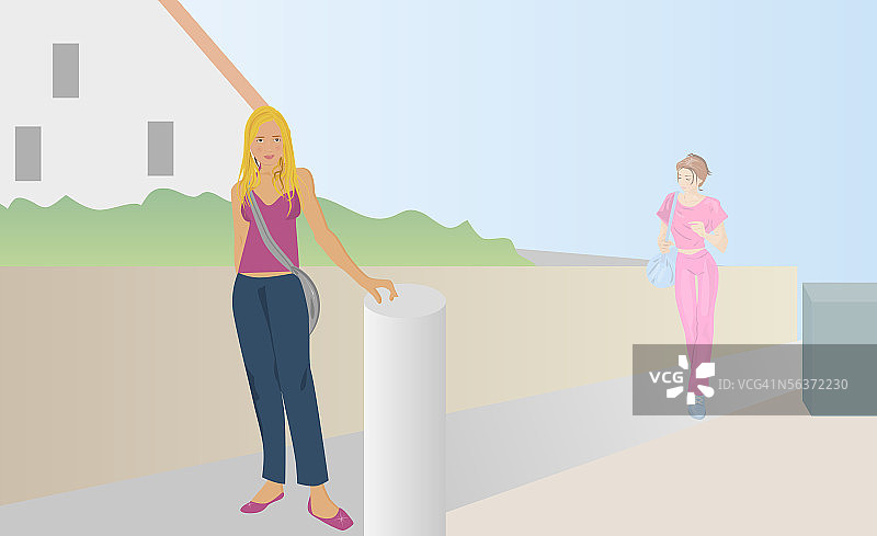 两个少女在人行道上行走图片素材