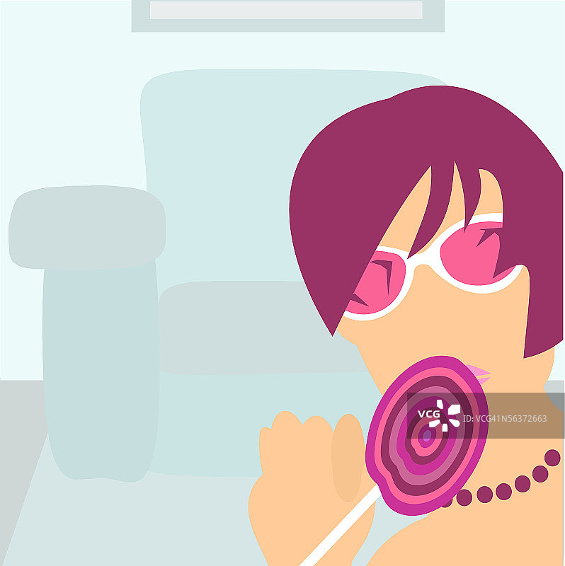 女人吃棒棒糖的特写图片素材