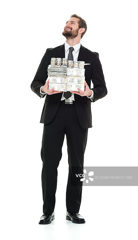 微笑的商人拿着钱图片素材