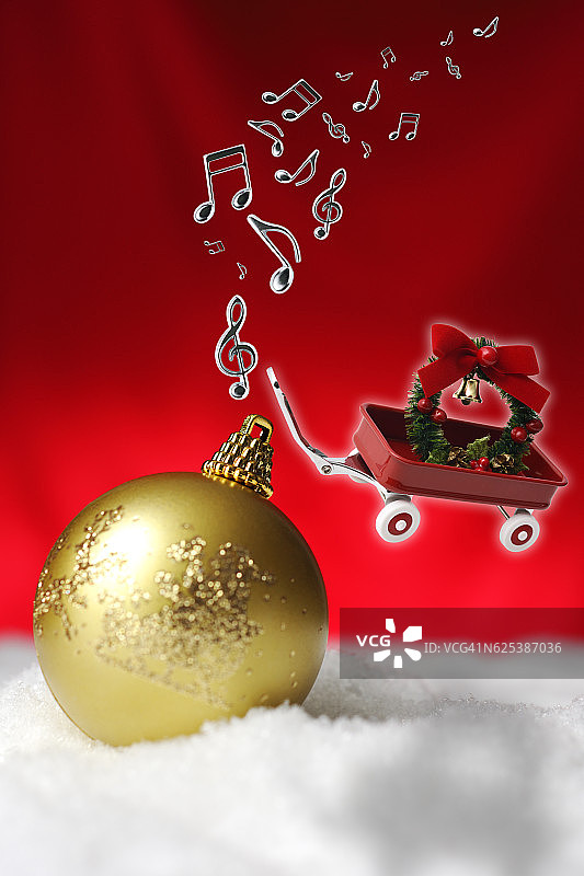 带有圣诞花环的飞行玩具红色货车和音符图片素材