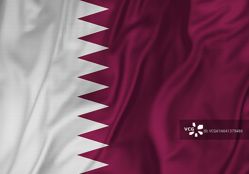 卡塔尔旗帜特写，卡塔尔旗帜在风中飘扬图片素材