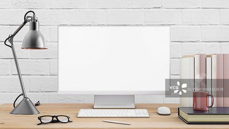 办公桌上的大型电脑显示器样机图片素材
