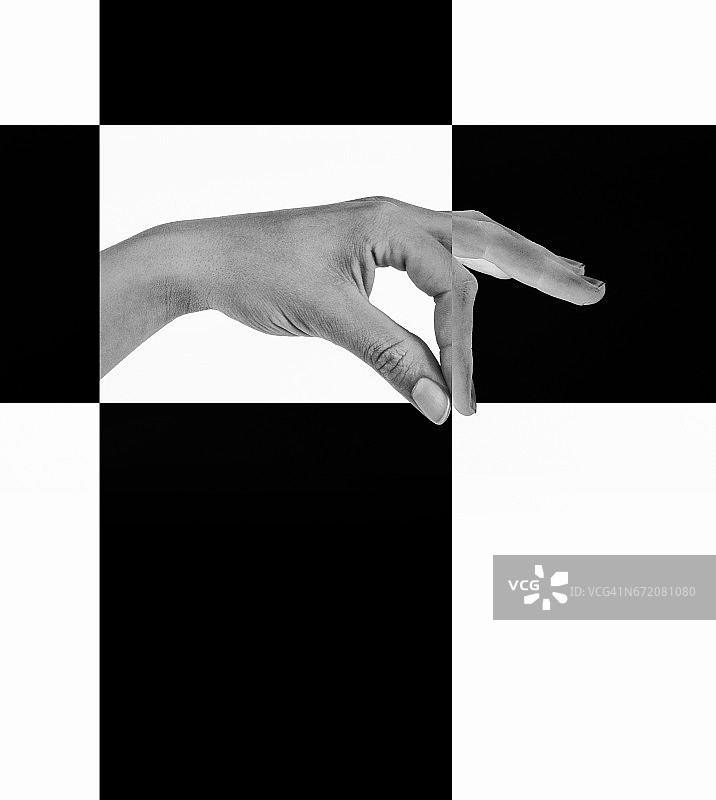 黑白平面构成中的一只手图片素材