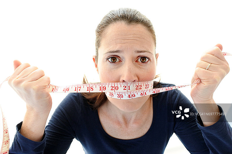年轻女人患有饮食失调症图片素材