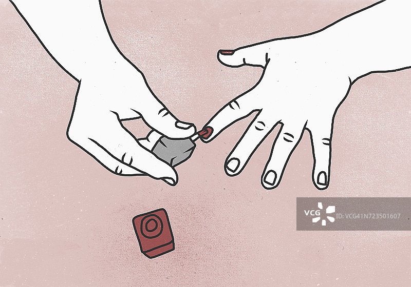 女子在彩色背景下涂指甲油的裁剪图像图片素材