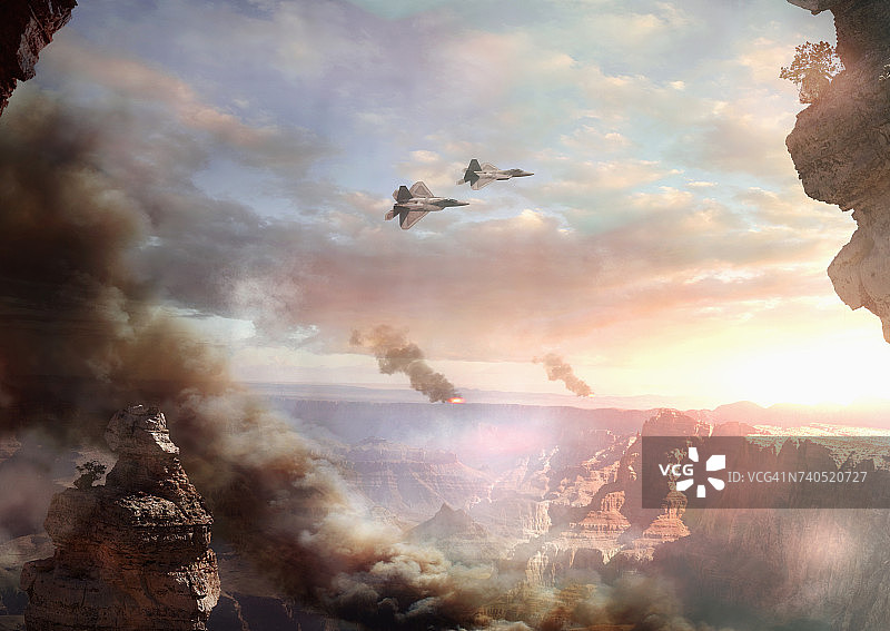 日落时分飞越峡谷的喷气式飞机图片素材