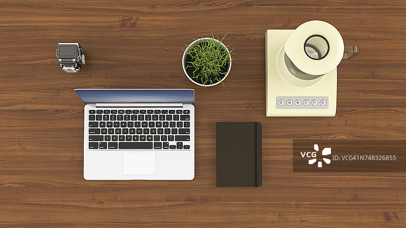 桌子上的笔记本电脑、相机、笔记本、盆栽小麦草和搅拌机图片素材