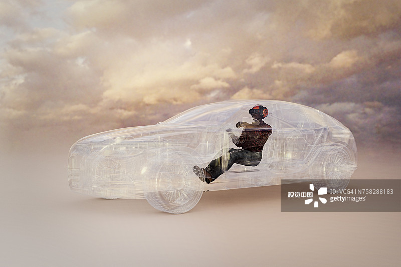 戴VR头盔开车的男人图片素材