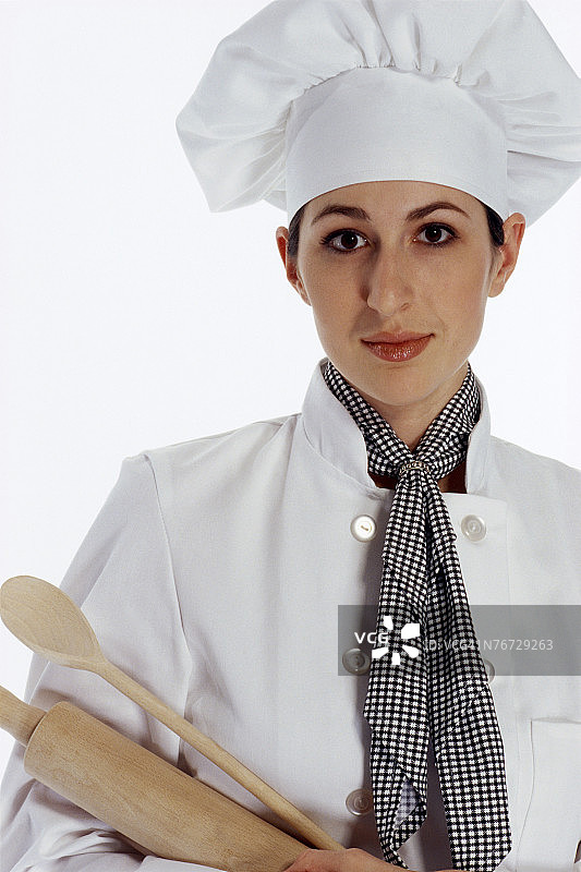 拿着烹饪用具的厨师图片素材