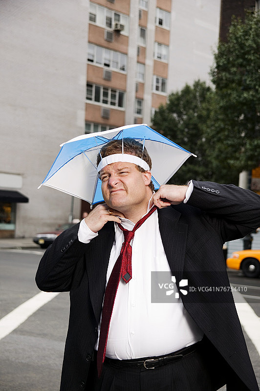 雨伞帽商人图片素材
