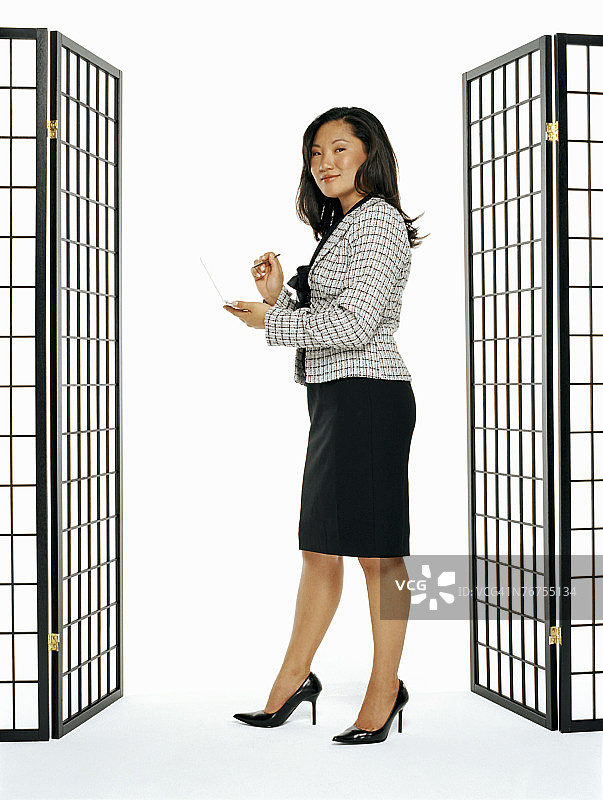 使用PDA的商务女人图片素材