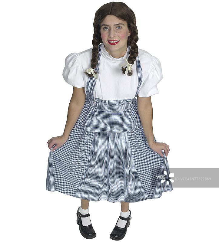 打扮成屈膝礼女学生的女人图片素材