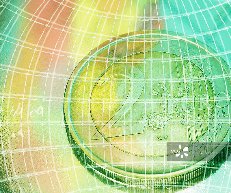 带有全球网格线的欧元硬币图片素材