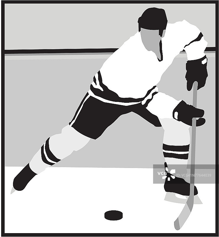 带冰球的冰球运动员图片素材