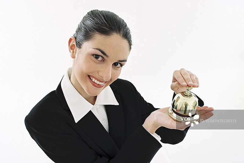 拿着服务铃的女人图片素材