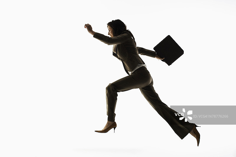 跳跃的女商人图片素材