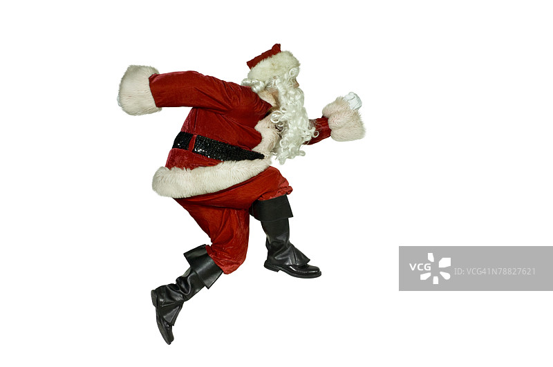 身穿圣诞老人服装的男人奔跑图片素材