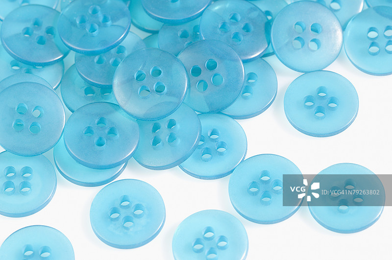 天蓝色按钮的特写镜头图片素材