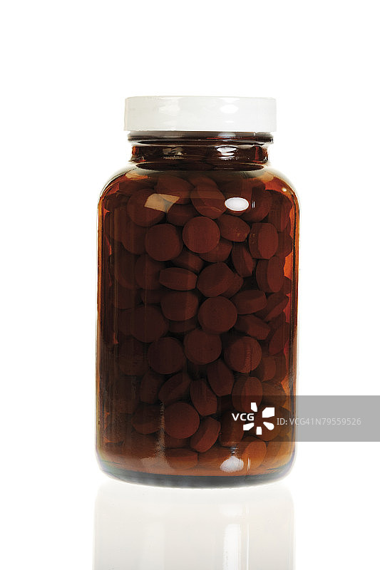 玻璃容器中的药片特写图片素材