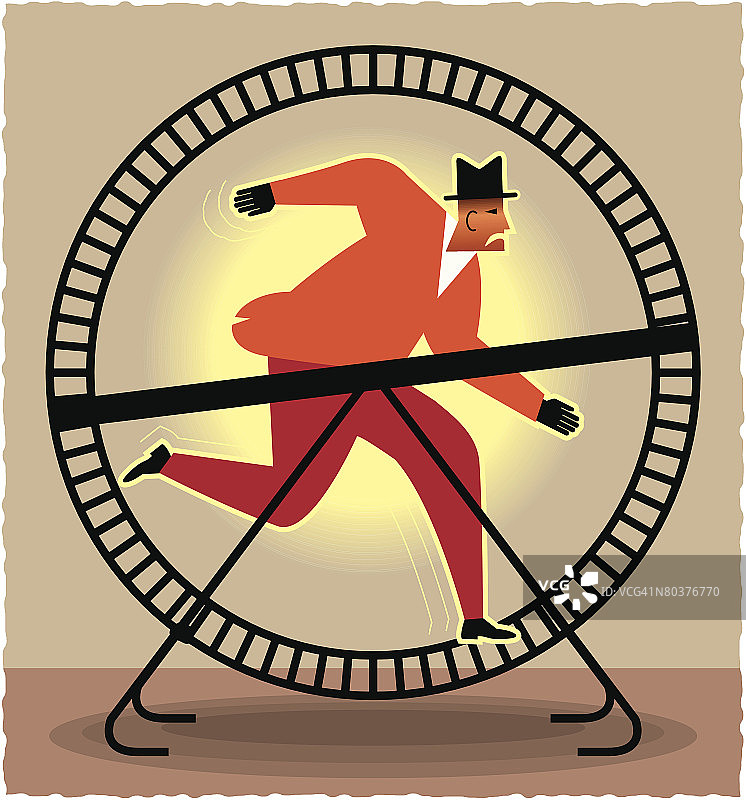 男人在仓鼠轮上奔跑图片素材