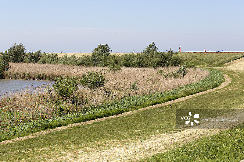 荷兰奥斯特瓦德斯普拉森自然保护区堤坝图片素材