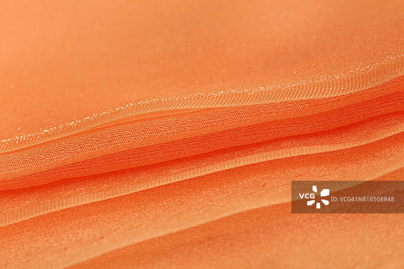 蜜桃色面料边缘特写图片素材