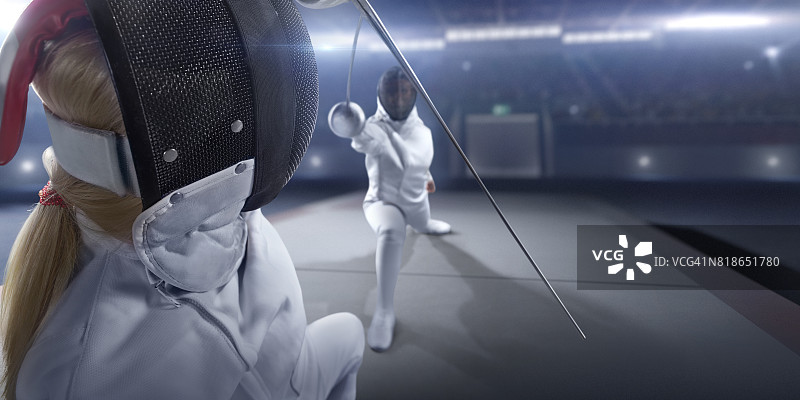 在大型专业舞台上的女子击剑比赛图片素材