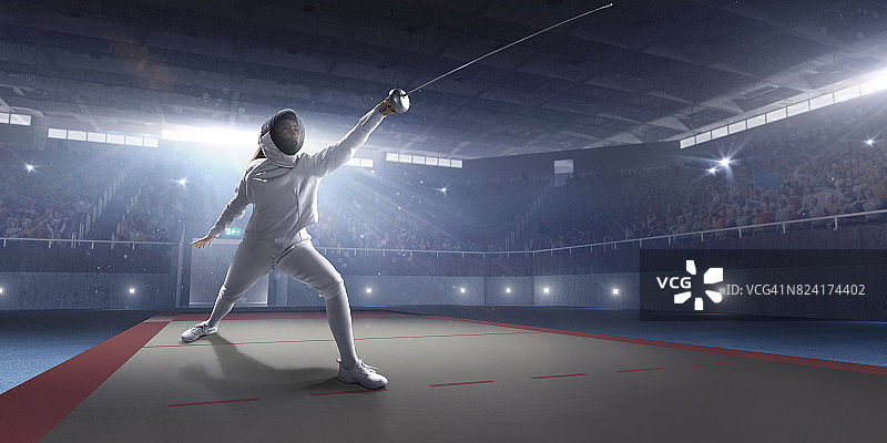 在大型专业舞台上的女子击剑运动员图片素材
