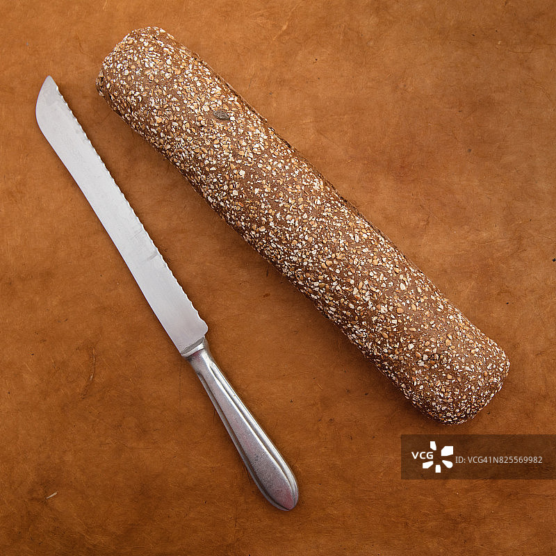 南瓜与葵花籽法棍和面包刀图片素材