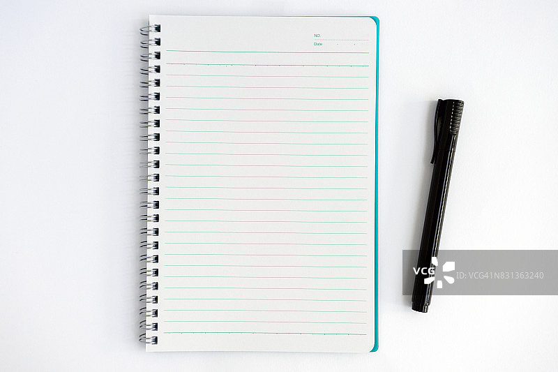 记事本和笔的俯视图图片素材