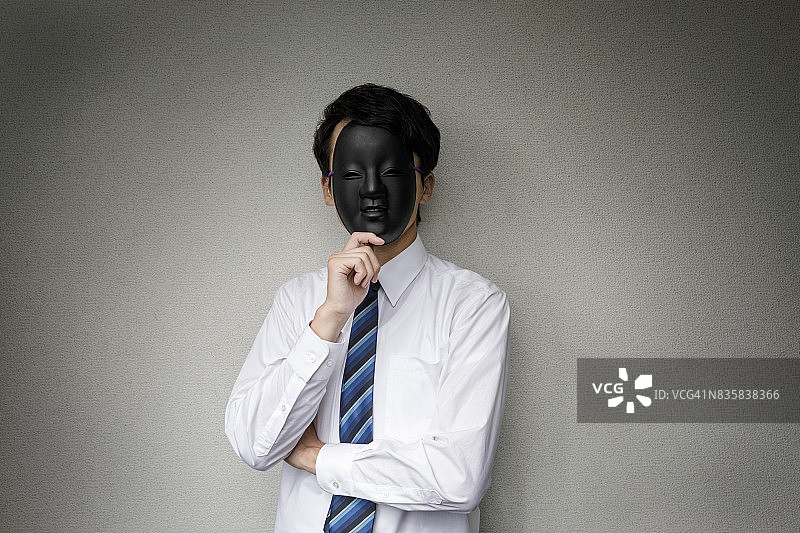 戴着面具的奇异商人图片素材