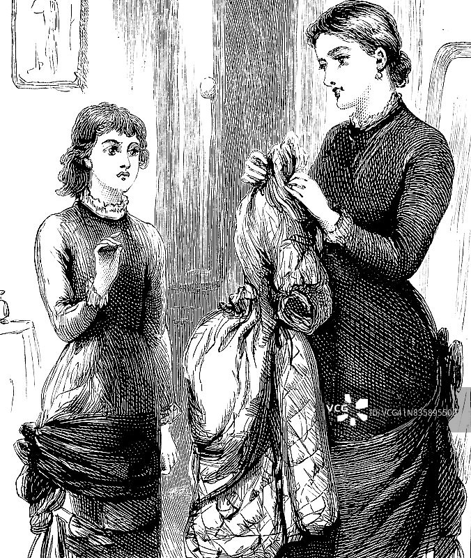 女儿在客厅里和母亲说话图片素材