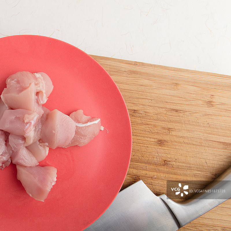 鸡肉片和中式菜刀图片素材