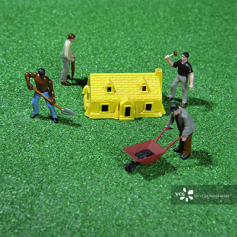 劳动者人偶与房屋图片素材