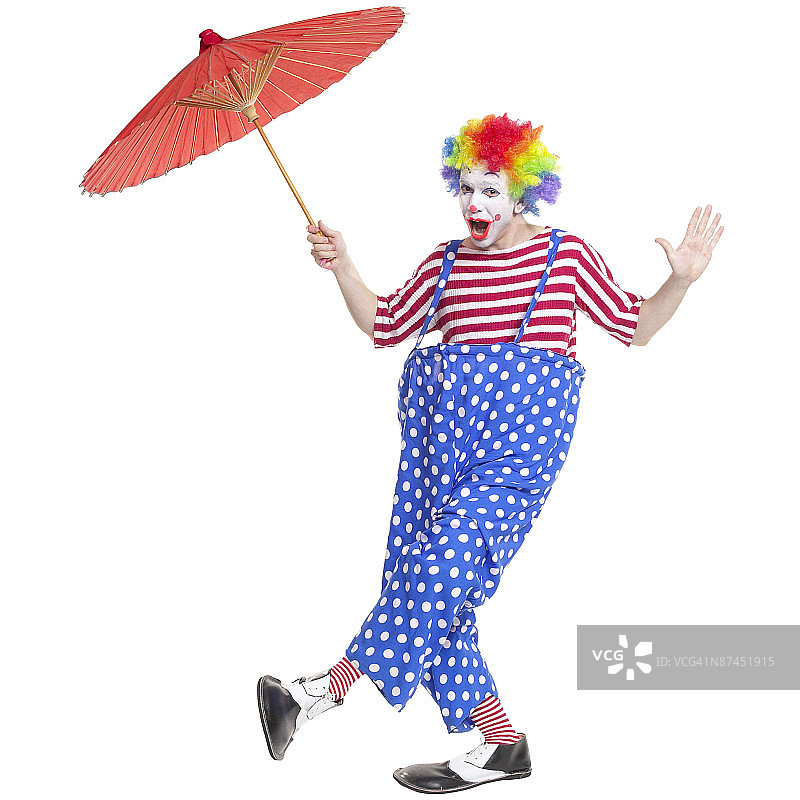 带阳伞的小丑图片素材
