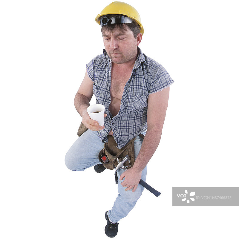 木匠坐着喝饮料图片素材