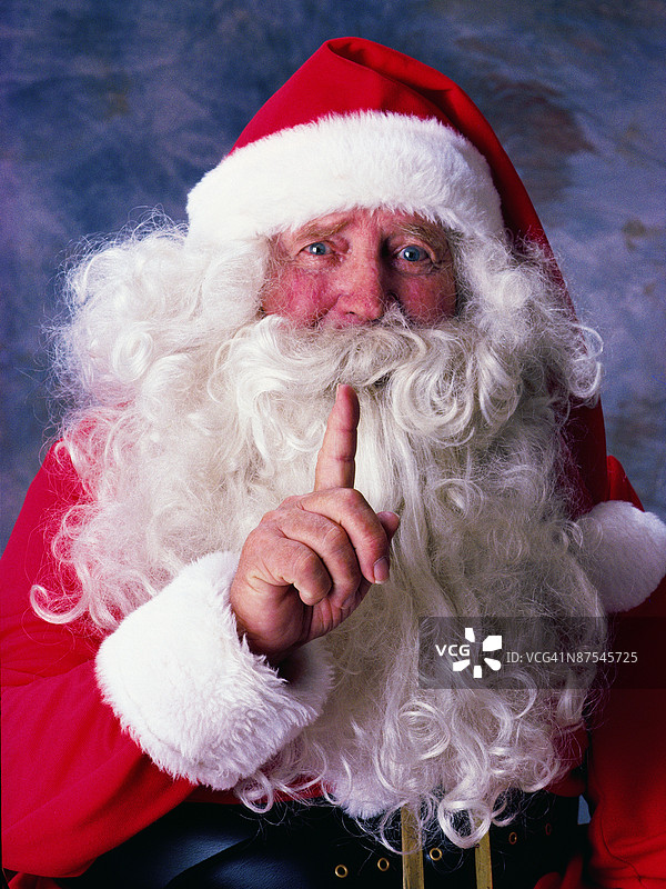 圣诞老人举起一根手指照片图片素材