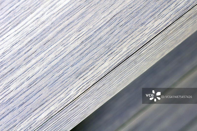 桌子边缘的木纹表面特写图片素材