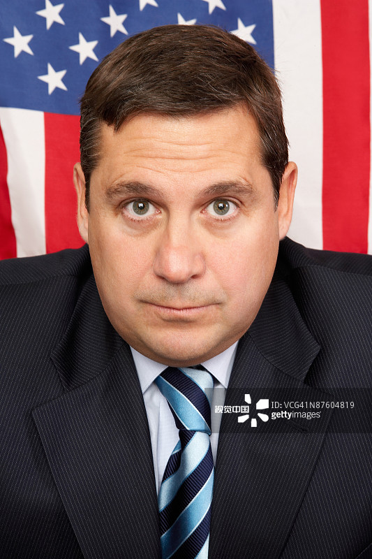 一个面无表情的政客的肖像图片素材