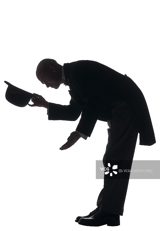 男子鞠躬的侧面图图片素材