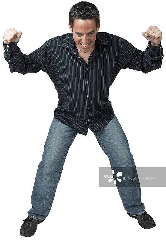 自豪的男人紧握双手图片素材