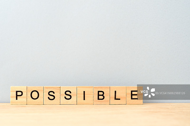 木制方块上的“可能性”字样图片素材