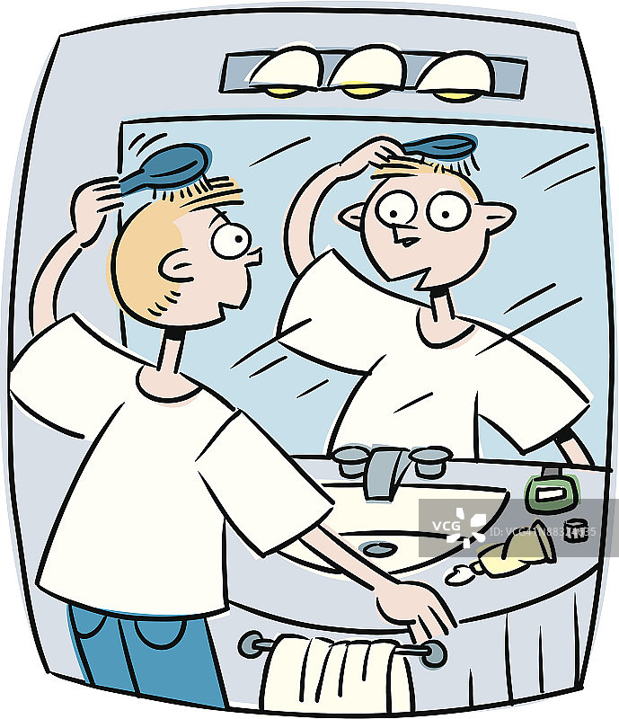 青少年男孩在镜子前梳头图片素材