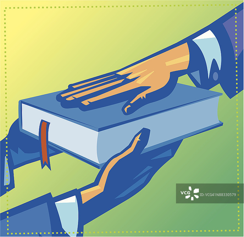 放在圣经上的手，彩色图片素材